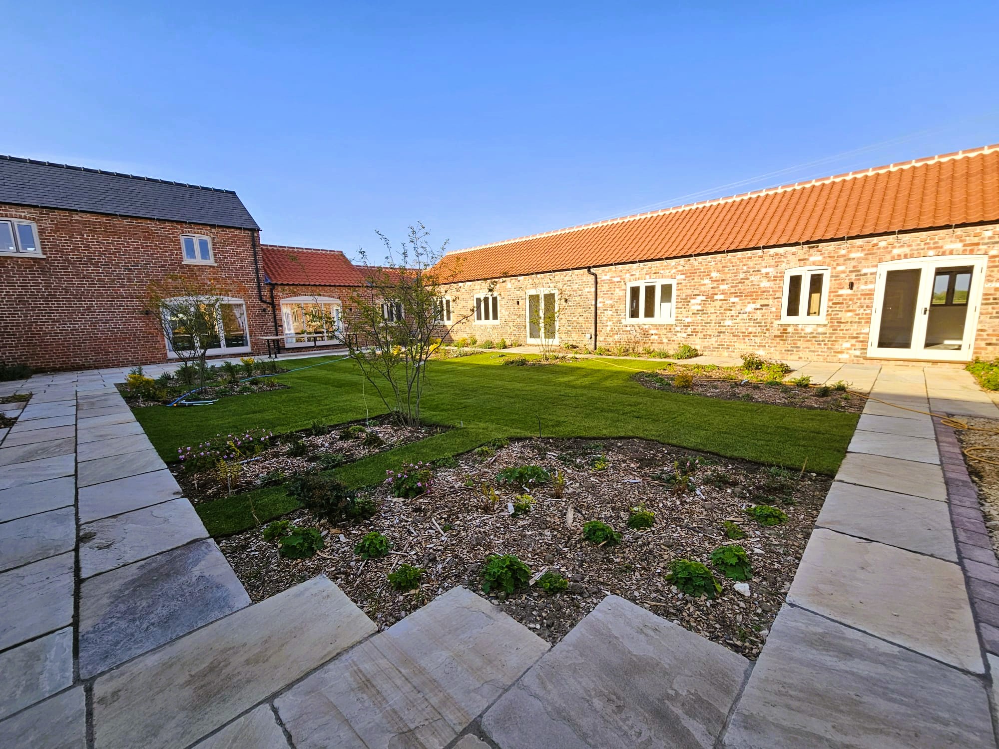 Lincolnshire Barn Conversion Garden with Seasonal Beauty. Low maintenance garden design near Sleaford and Spalding
