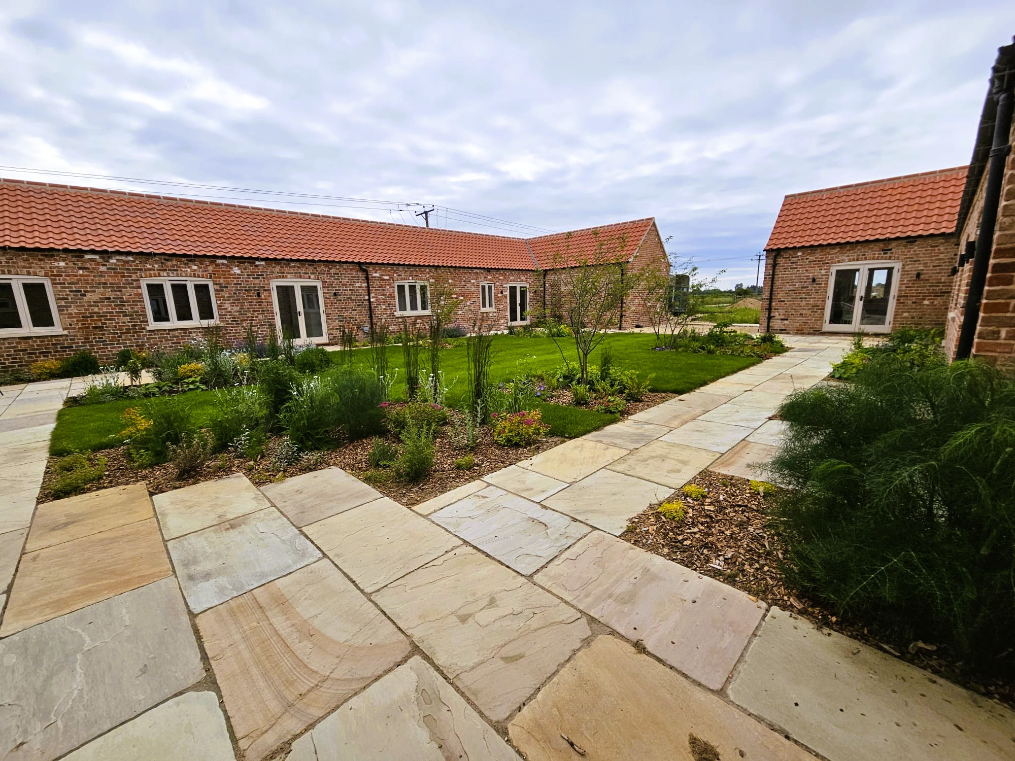 Lincolnshire Barn Conversion Garden with Seasonal Beauty. Low maintenance garden design near Sleaford and Spalding